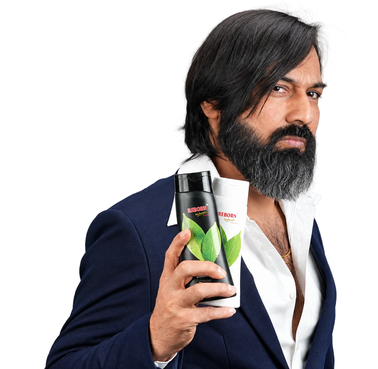 Reborn Naturals founder holding Kaadha Shampoo and Conditioner